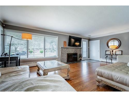 24 Munro Street, Thorold, ON - Indoor Photo Showing Living Room With Fireplace