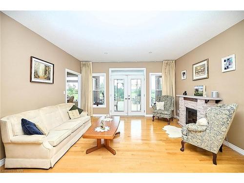 3772 Canborough Road, Fenwick, ON - Indoor Photo Showing Living Room With Fireplace