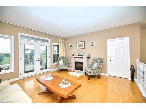 3772 Canborough Road, Fenwick, ON - Indoor Photo Showing Living Room With Fireplace