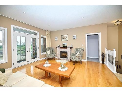 3772 Canborough Road, Fenwick, ON - Indoor Photo Showing Living Room With Fireplace