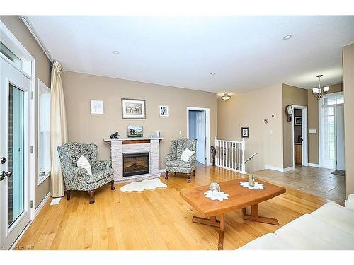 3772 Canborough Road, Fenwick, ON - Indoor Photo Showing Living Room With Fireplace