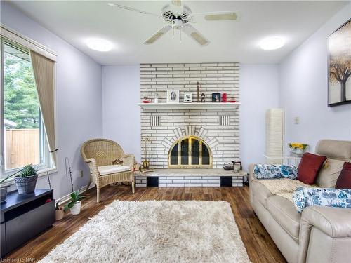 8 Bolger Drive, St. Catharines, ON - Indoor Photo Showing Living Room With Fireplace