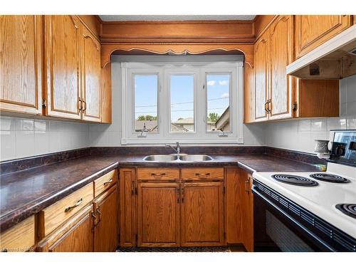 11 Meadowvale Drive, St. Catharines, ON - Indoor Photo Showing Kitchen With Double Sink