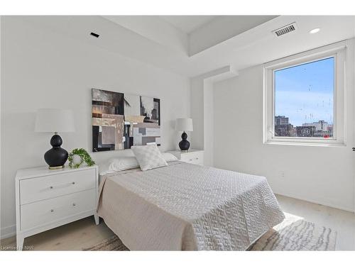 2 Bedroom-57 Carlisle Street, St. Catharines, ON - Indoor Photo Showing Bedroom