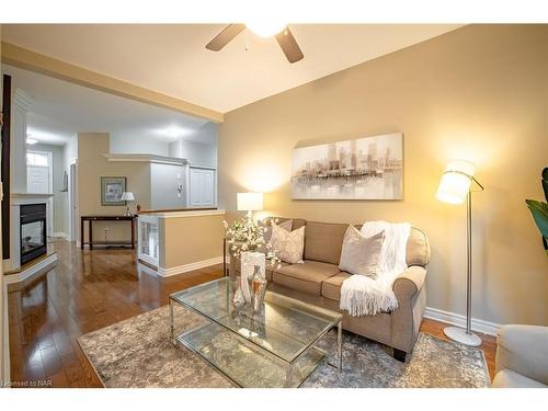 8-27 Parnell Road, St. Catharines, ON - Indoor Photo Showing Living Room With Fireplace