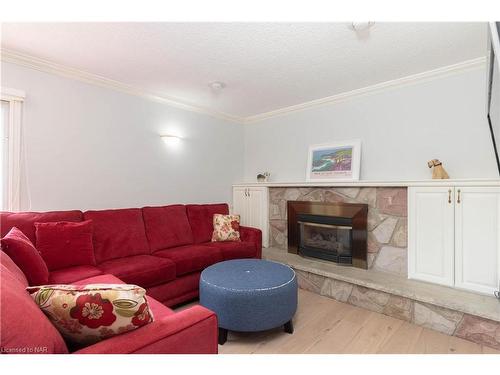 22 Port Master Drive, St. Catharines, ON - Indoor Photo Showing Living Room With Fireplace