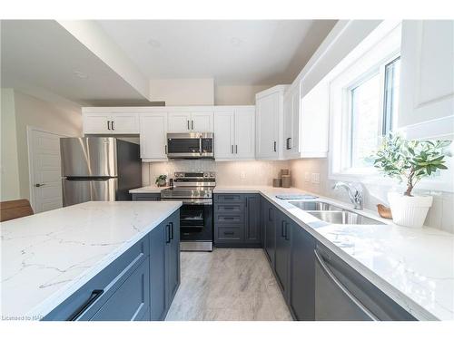 A-427 Vine Street, St. Catharines, ON - Indoor Photo Showing Kitchen With Stainless Steel Kitchen With Double Sink With Upgraded Kitchen