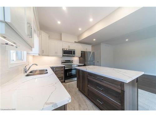 B-427 Vine Street, St. Catharines, ON - Indoor Photo Showing Kitchen With Double Sink