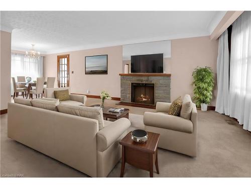 13 Draper Drive, St. Catharines, ON - Indoor Photo Showing Living Room With Fireplace