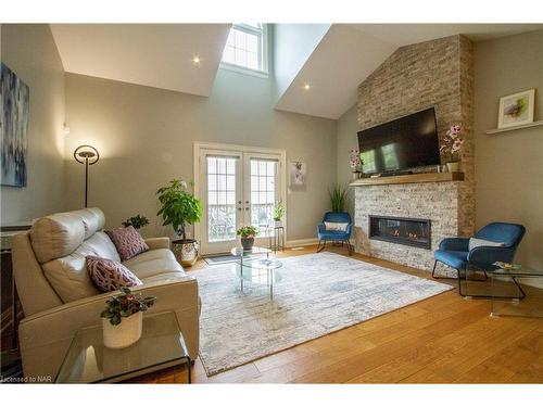 62-3232 Montrose Road, Niagara Falls, ON - Indoor Photo Showing Living Room With Fireplace