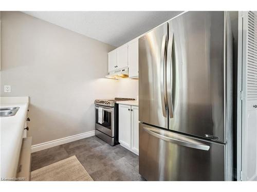 35 Fairington Crescent, St. Catharines, ON - Indoor Photo Showing Kitchen With Double Sink