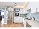 1204-15 Towering Heights Boulevard, St. Catharines, ON  - Indoor Photo Showing Kitchen With Stainless Steel Kitchen With Upgraded Kitchen 