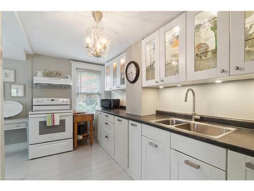 18 Rose Street, St. Catharines, ON - Indoor Photo Showing Kitchen With Double Sink