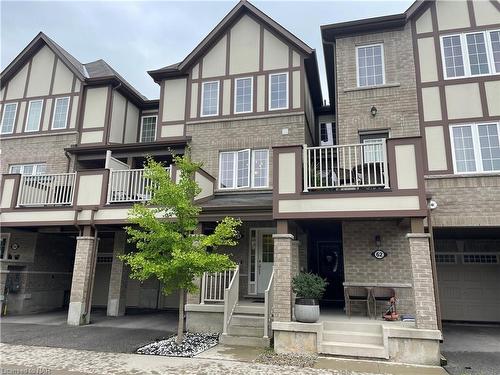 61-22 Spring Creek Drive, Waterdown, ON - Outdoor With Facade