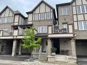 61-22 Spring Creek Drive, Waterdown, ON  - Outdoor With Facade 