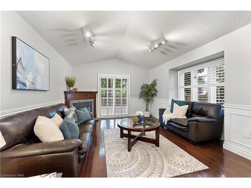 7949 Grossi Court, Niagara Falls, ON - Indoor Photo Showing Living Room With Fireplace