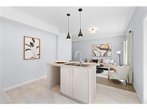 22-5672 Dorchester Road, Niagara Falls, ON - Indoor Photo Showing Kitchen With Double Sink