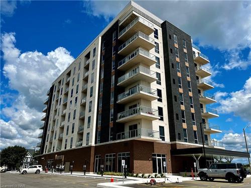 801-118 West Street, Port Colborne, ON - Outdoor With Balcony With Facade