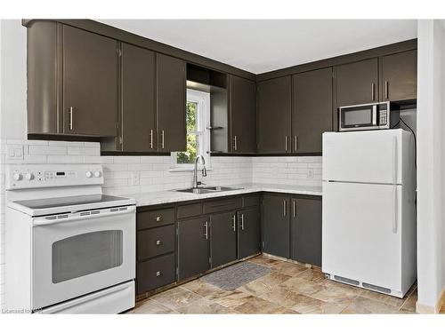 25 Sherbourne Street, St. Catharines, ON - Indoor Photo Showing Kitchen With Double Sink