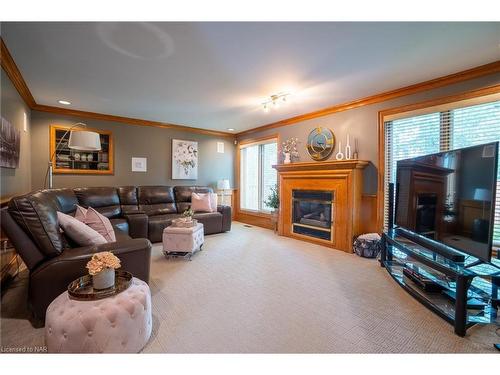 7775 St. Augustine Drive, Niagara Falls, ON - Indoor Photo Showing Living Room With Fireplace