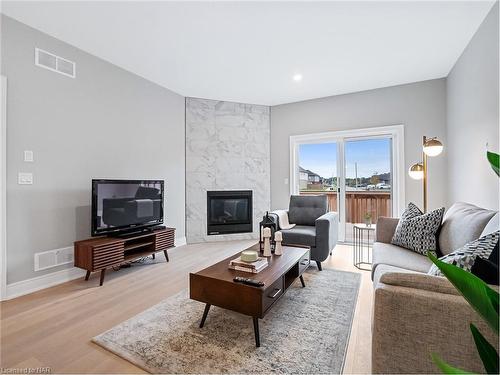 32 Austin Drive, Welland, ON - Indoor Photo Showing Living Room With Fireplace