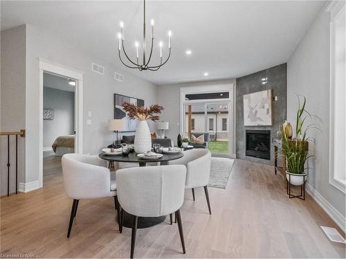 211 Sycamore Street, Welland, ON - Indoor Photo Showing Dining Room With Fireplace