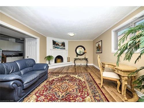 47 Monarch Park Drive, St. Catharines, ON - Indoor Photo Showing Living Room With Fireplace