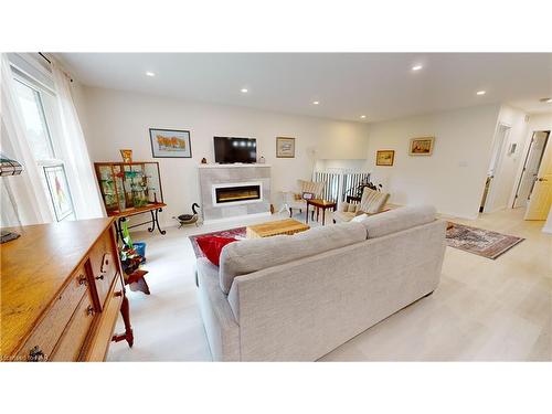 84 Ziraldo Road, St. Catharines, ON - Indoor Photo Showing Living Room With Fireplace