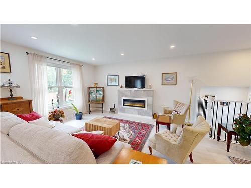 84 Ziraldo Road, St. Catharines, ON - Indoor Photo Showing Living Room With Fireplace