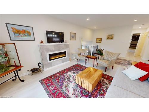 84 Ziraldo Road, St. Catharines, ON - Indoor Photo Showing Living Room With Fireplace