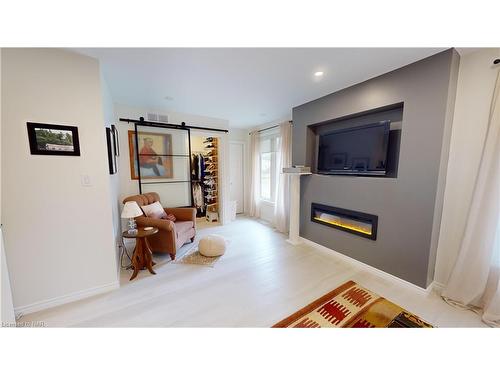 84 Ziraldo Road, St. Catharines, ON - Indoor Photo Showing Living Room With Fireplace