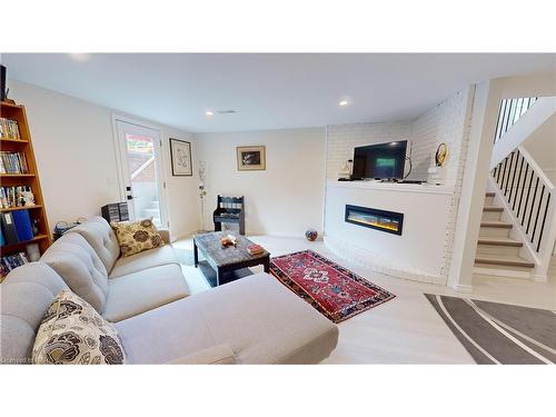 84 Ziraldo Road, St. Catharines, ON - Indoor Photo Showing Living Room With Fireplace