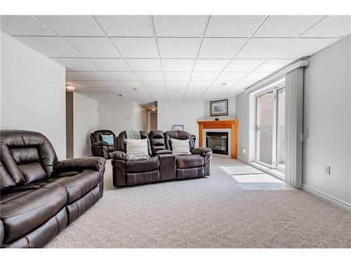 64 Sandra Drive, Fenwick, ON - Indoor Photo Showing Other Room With Fireplace