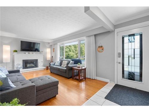 8848 Banting Street, Niagara Falls, ON - Indoor Photo Showing Living Room With Fireplace