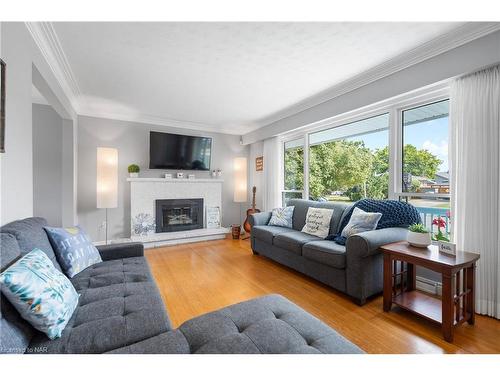 8848 Banting Street, Niagara Falls, ON - Indoor Photo Showing Living Room With Fireplace