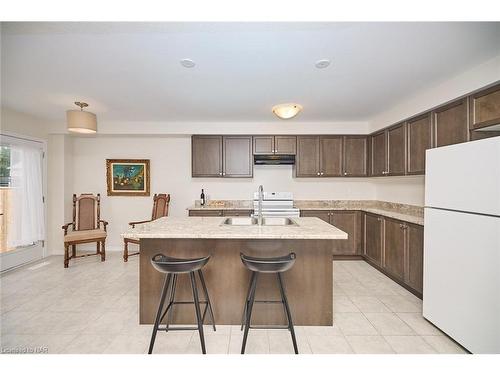 7739 Dockweed Drive Drive, Niagara Falls, ON - Indoor Photo Showing Kitchen With Double Sink