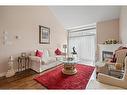 Ten-4300 Kalar Road, Niagara Falls, ON  - Indoor Photo Showing Living Room With Fireplace 