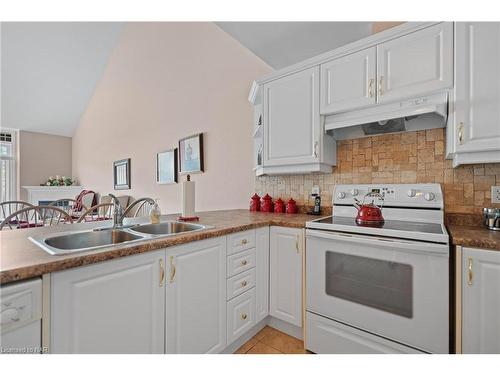 Ten-4300 Kalar Road, Niagara Falls, ON - Indoor Photo Showing Kitchen With Double Sink