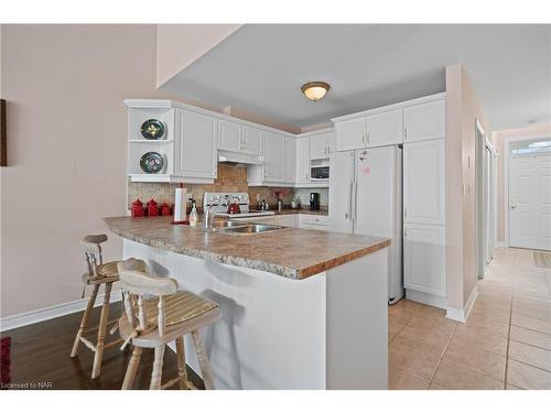 Ten-4300 Kalar Road, Niagara Falls, ON - Indoor Photo Showing Kitchen With Double Sink