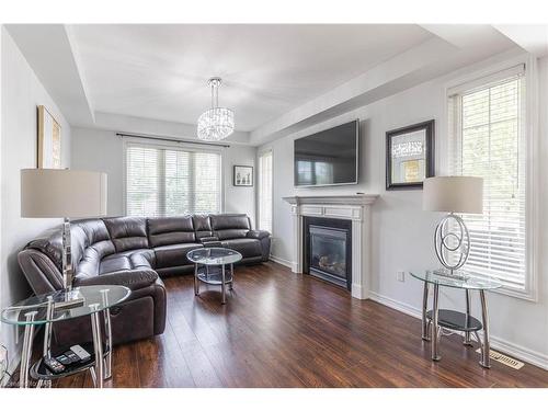 8760 Milomir Street, Niagara Falls, ON - Indoor Photo Showing Living Room With Fireplace