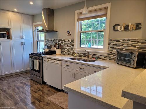 40 Walnut Street, Port Colborne, ON - Indoor Photo Showing Kitchen With Fireplace With Double Sink