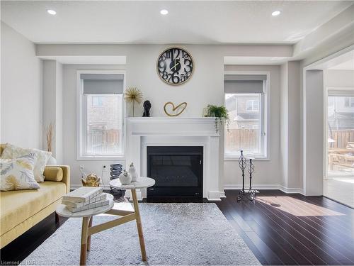 7725 Black Maple Drive, Niagara Falls, ON - Indoor Photo Showing Living Room With Fireplace