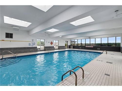 411-7 Gale Crescent, St. Catharines, ON - Indoor Photo Showing Other Room With In Ground Pool