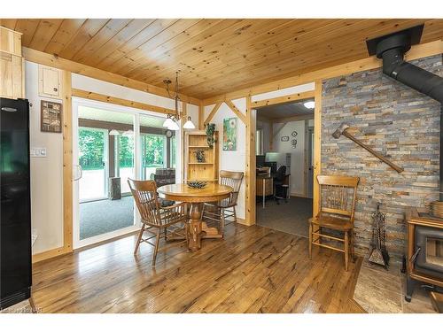 12264 Brawn Road, Wainfleet, ON - Indoor Photo Showing Dining Room With Fireplace