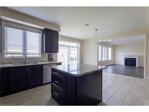 9462 Tallgrass Avenue, Niagara Falls, ON - Indoor Photo Showing Kitchen With Fireplace With Double Sink