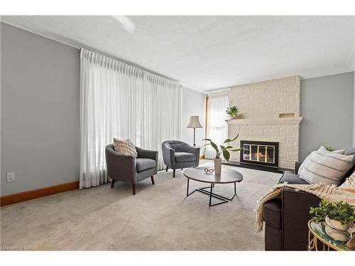 12 Broderick Avenue, Thorold, ON - Indoor Photo Showing Living Room With Fireplace