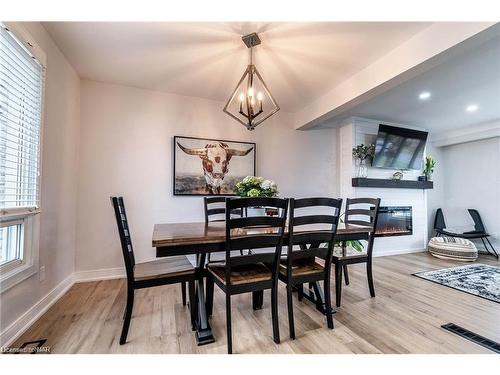 6921 Freeman Street, Niagara Falls, ON - Indoor Photo Showing Dining Room With Fireplace