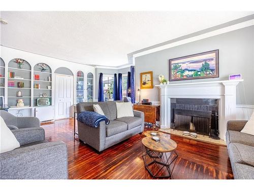 7967 Booth Street, Niagara Falls, ON - Indoor Photo Showing Living Room With Fireplace