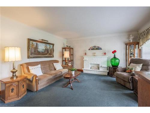 11 Brisbane Glen, St. Catharines, ON - Indoor Photo Showing Living Room With Fireplace