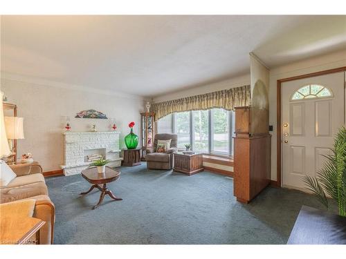 11 Brisbane Glen, St. Catharines, ON - Indoor Photo Showing Living Room With Fireplace